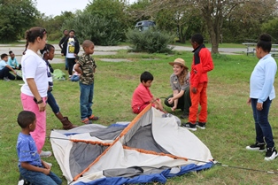 Ranger Kathryn with 4th graders Ranger Kathryn teaching 4th graders how to put up a tent