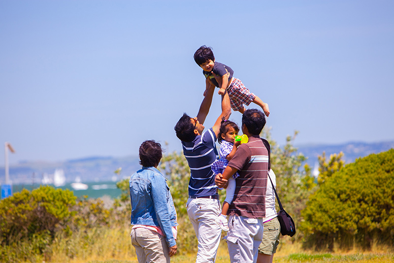 family playing outdoors