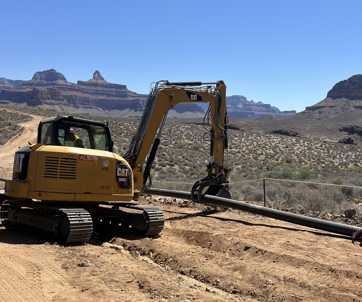 Construction equipment along the Plateau Point Trail Grand Canyon behind with a blue sky