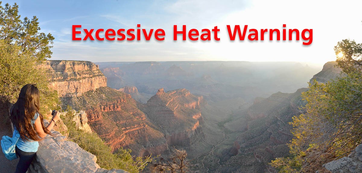 A woman takes a picture of the canyon with the words "excessive heat warning" in red lettering overlayed