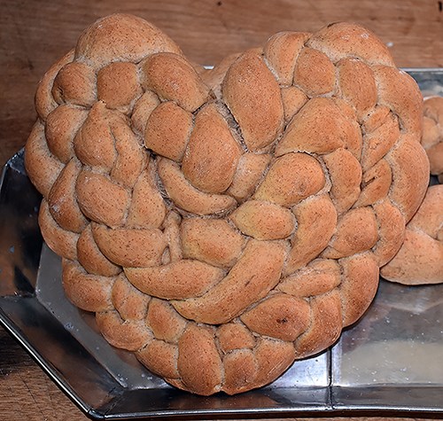 A braided loaf in the shape of a heart.