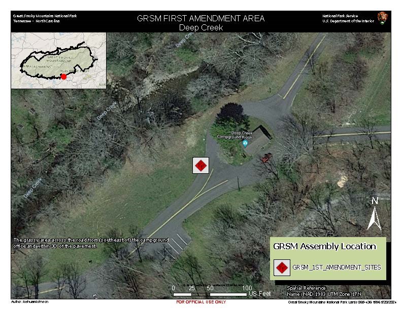 Deep Creek 1st Amendment Area map. Red diamond in white square in grassy area across the road (southeast of) campground office and within 30’ of pavement. Trees, grass and Deep Creek on map. Inset park map in corner. Scale: 100 ft