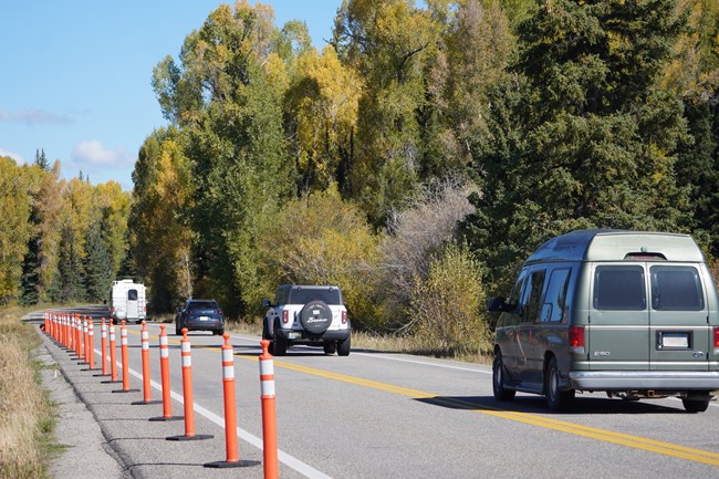 Cars moving through the construction zone on Highway 26/89/191