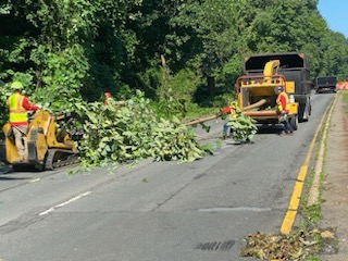 Crews clean up the GW Parkway with wood chippers