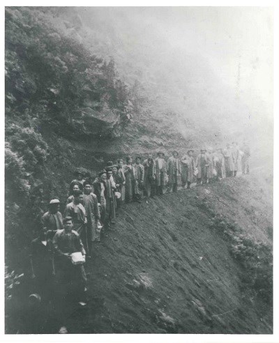 Civilian Conservation Corps (CCC) crew on Halemauʻu Trail working on the current alignment. Photo taken in 1936.