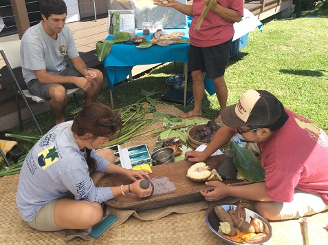 The Kīpahulu Ohaha demonstrates poi pounding