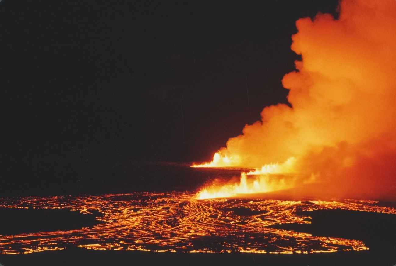An echelon of fissures emitting lava.