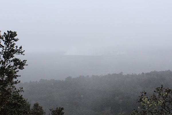 Halema‘uma‘u obscured by rain and ash clouds