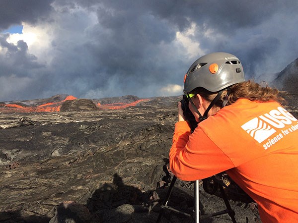 USGS Hawaiian Volcano Observatory scientist monitors Kīlauea Volcano's Lower East Rift Zone lava flow on 6/25/2018