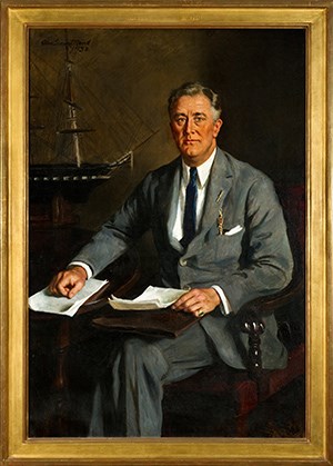 A painted portrait of a man (FDR) wearing a suit. A model of a ship is in the background.