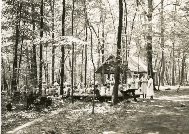 Group of picnickers at the open-air shelter at Baptism Creek