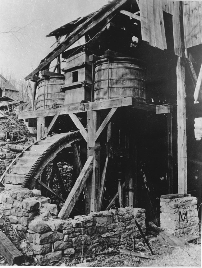 This 1930s photograph shows a waterwheel that was built at Hopewell Furnace in 1879.