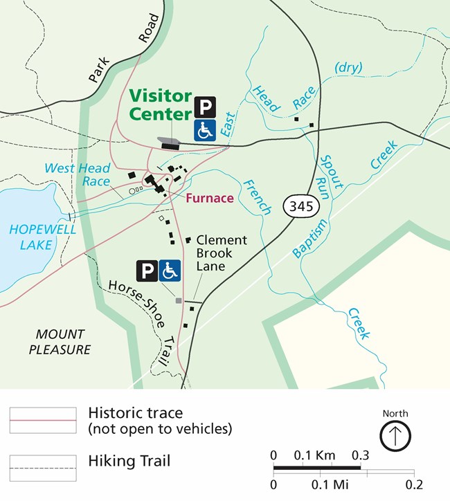 Map of Hopewell Furnace Dipecting the vistior and village accessible parking areas. The village parking area is located south of the visitor center. The road leads away from teh visitor center, turn left and head south on 345. Turn right on Clement Brook.