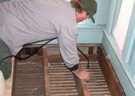 The wetting agent is injected into the drilled lath holes.