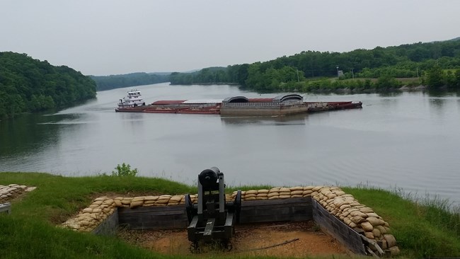 Tug boat and barge on the river at Fort Donelson National Battlefield.