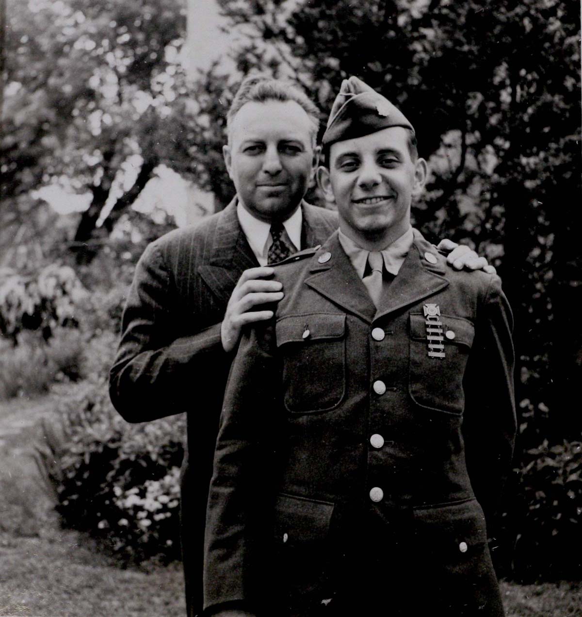 Edwin Way Teale stands with his son David who is wearing a military uniform 