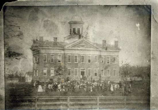 Hiram College a faded ohoto of a brick building known as Western Reserve Eclectic Institute