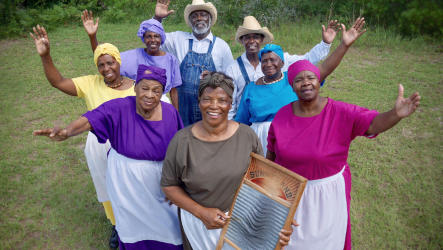 A group of Gullah GeeChee people smiling together.