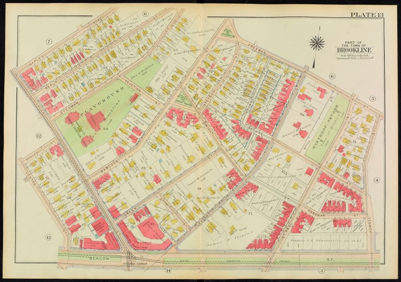 A colorful, ink drawn, paper map of part of Brookline in 1919. About half the buildings are colored in pink ink, while the other half are colored in yellow, and public spaces are colored in light green.