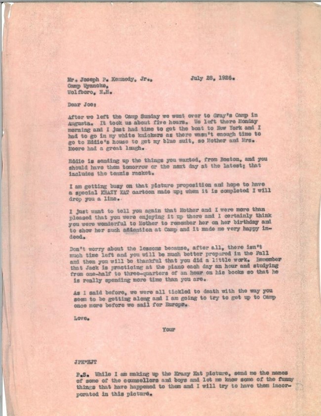 A letter typed on a pink piece of paper.