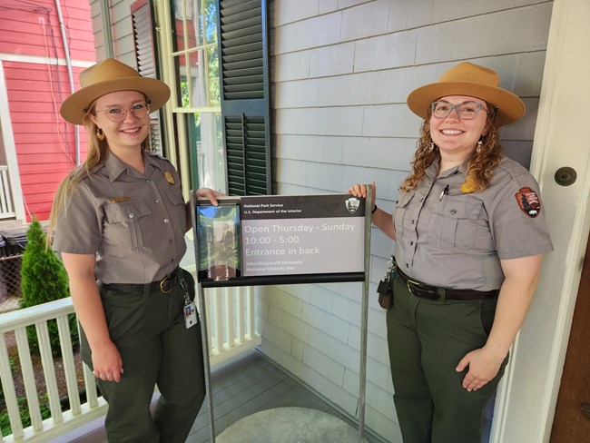 STAFF WITH OPEN SIGN