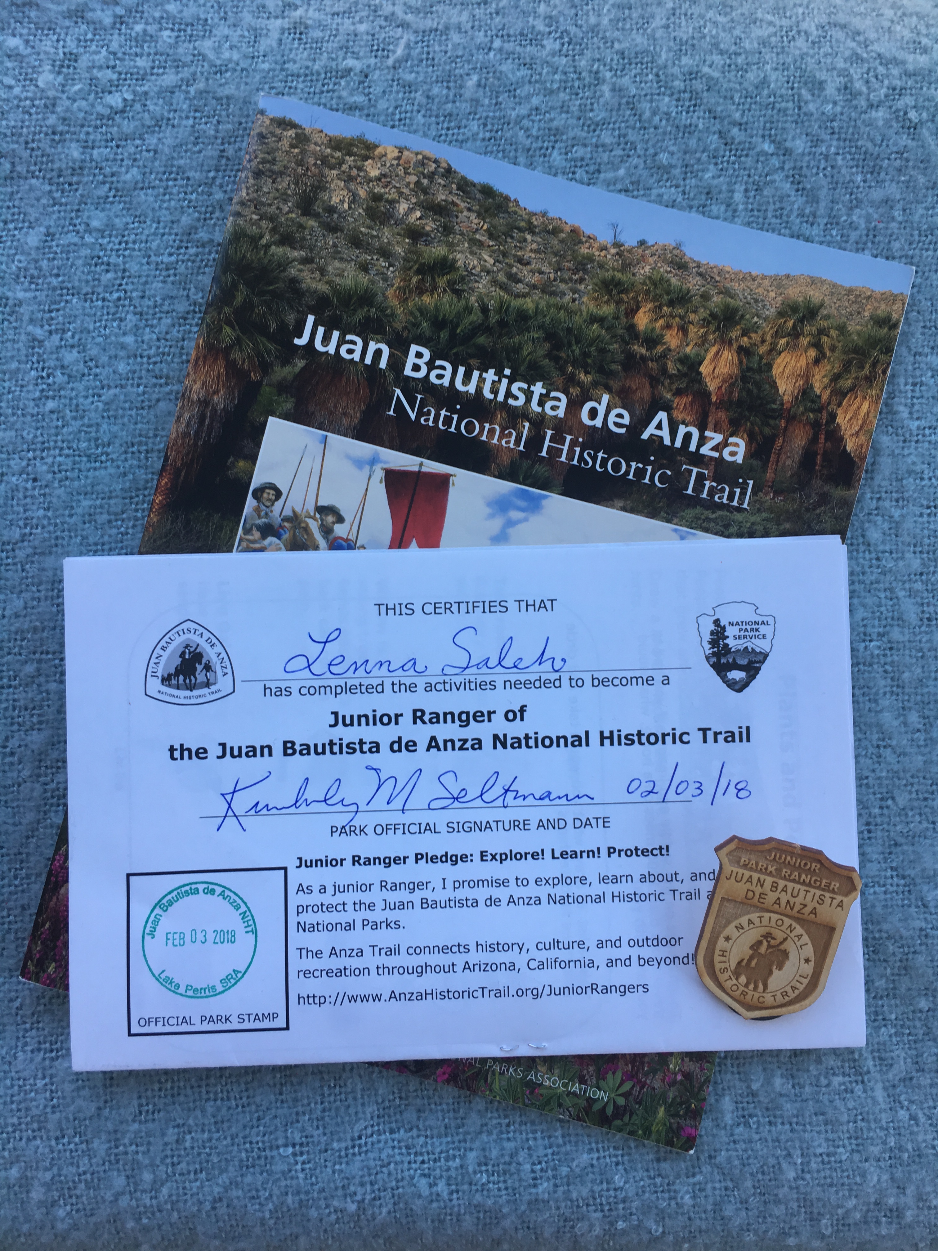 A complete junior ranger certificate, badge, and book about the Anza Trail.