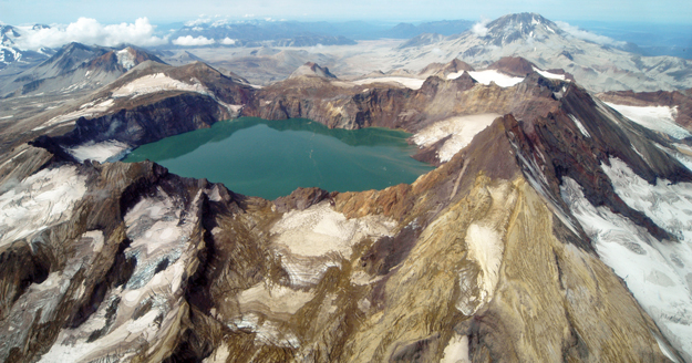 Several thousand feet of Mount Katmai collapsed when magma was drained from underneath it. A deep lake now fills most of the caldera.