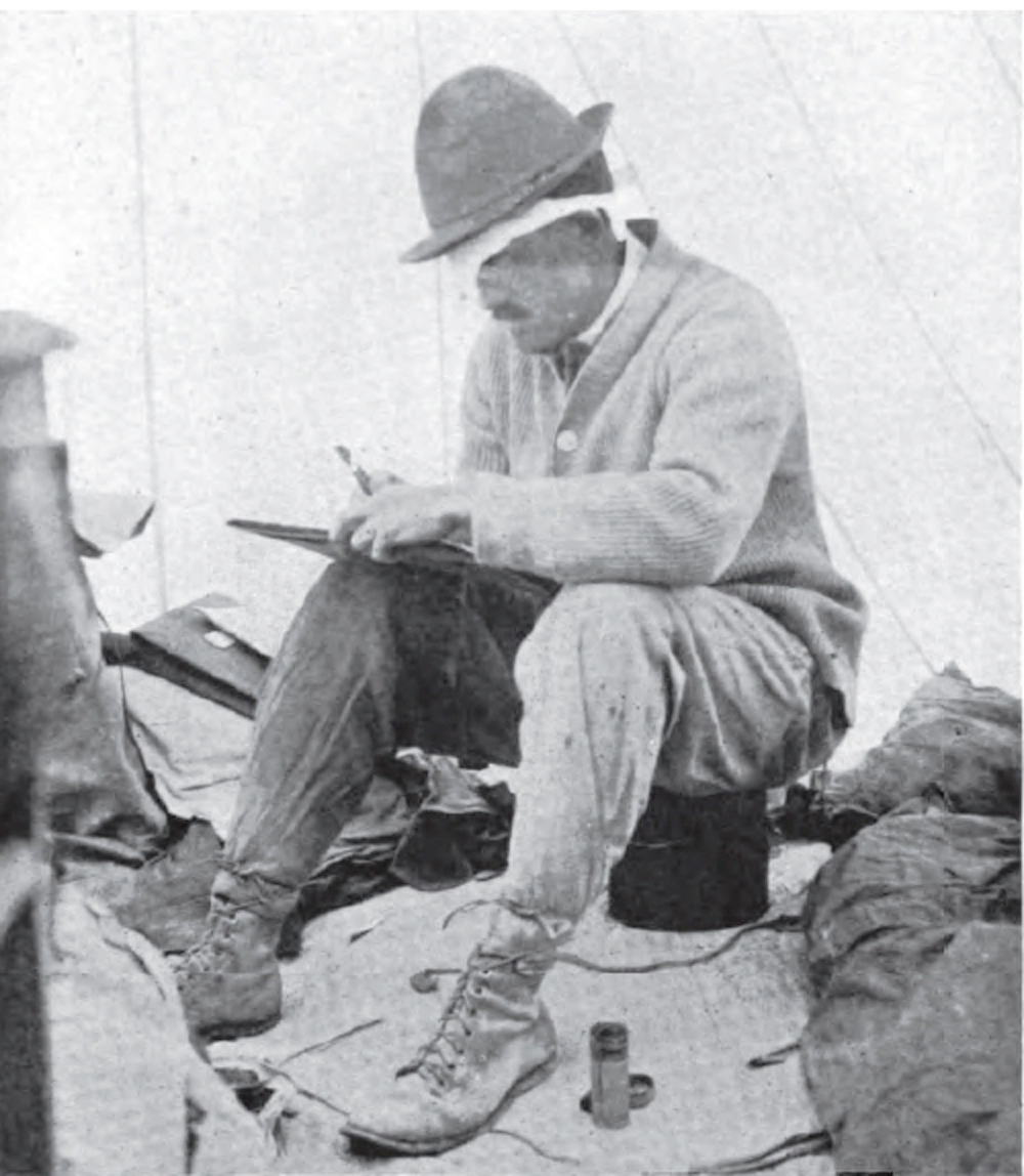 Griggs wearing a bandage on eye and sitting inside tent