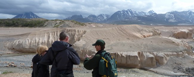 A ranger leads visitors on the Valley of Ten Thousand Smokes Tour