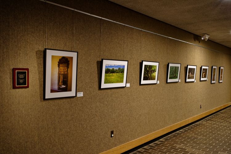 Photographs lined up on the wall inside the Jockey Hollow Visitor Center.