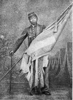 William Carney holds the American flag while in Union Army colors.