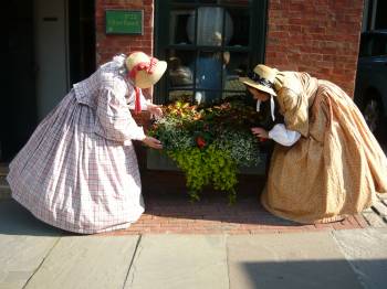 Ruth and Abby tend to flowers