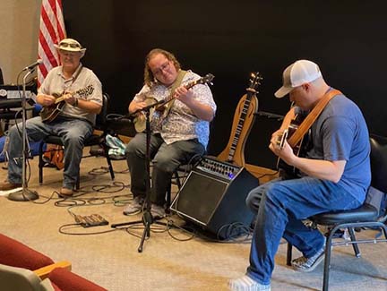 musicians playing on a stage