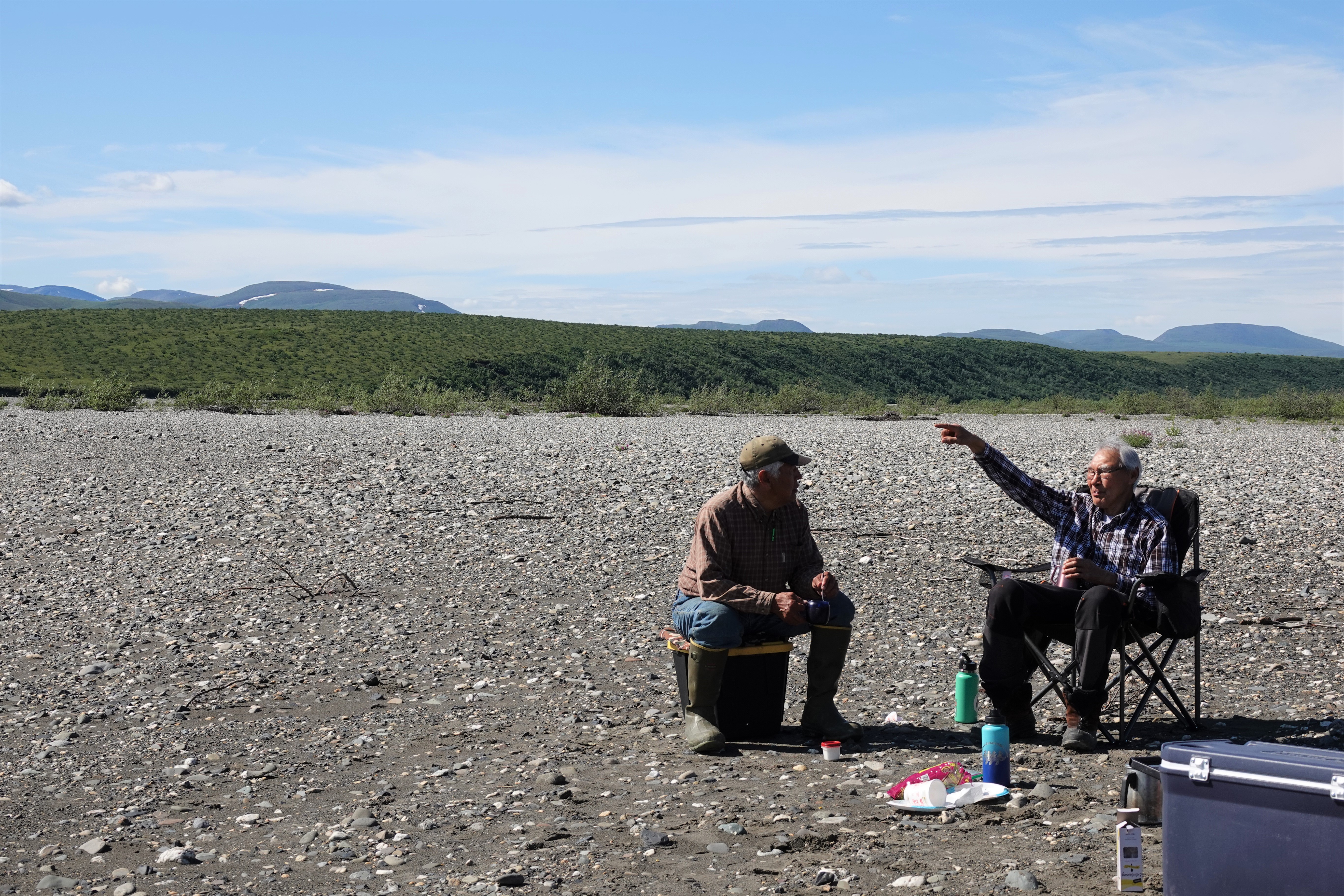 Two elders discuss traditional place names along the NOatak River.