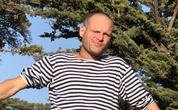 close up of a man in a t-shirt