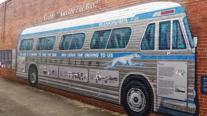 Painting on a brick wall of a Freedoms Rider greyhound bus