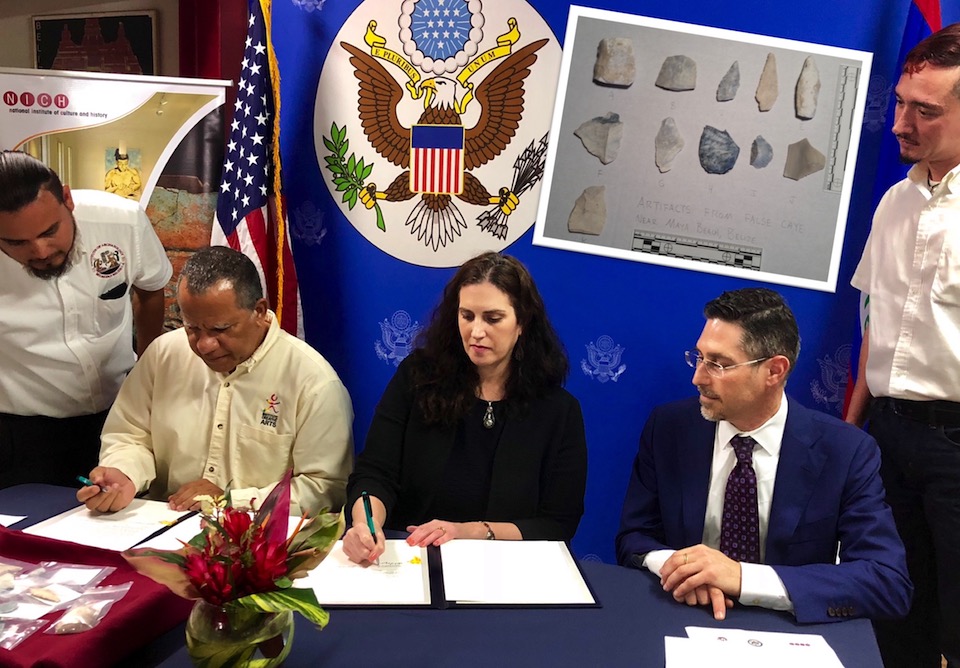 Representatives of the US and Belize sign a cultural property agreement solidifying their collaboration to combat looting and trafficking of cultural objects. Inset: 11 cultural artifacts stolen from Belize recovered and returned by ISB Special Agents.