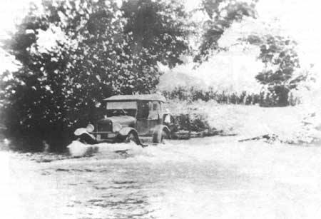 an old car crossing the Jacks Fork River