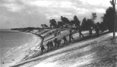 workers grading slope
