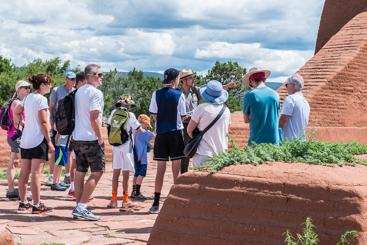 people, ranger, tour, building, blue sky