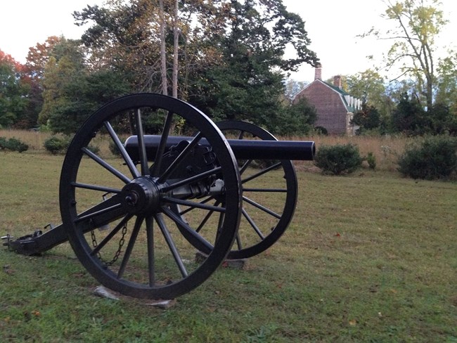 A cannon sits on the lawn of the historic Shelton property