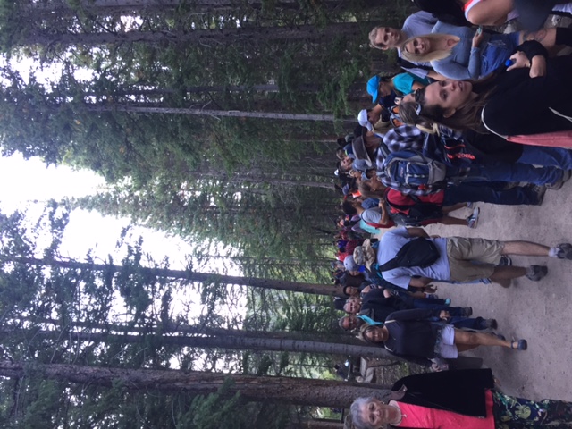 Visitors wait to board shuttle buses at Bear Lake in 2018