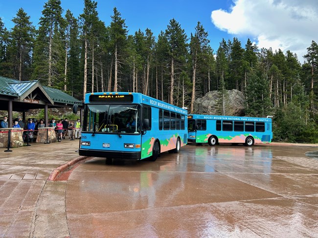 One Bear Lake Shuttle is departing from Bear Lake Parking and a second is arriving