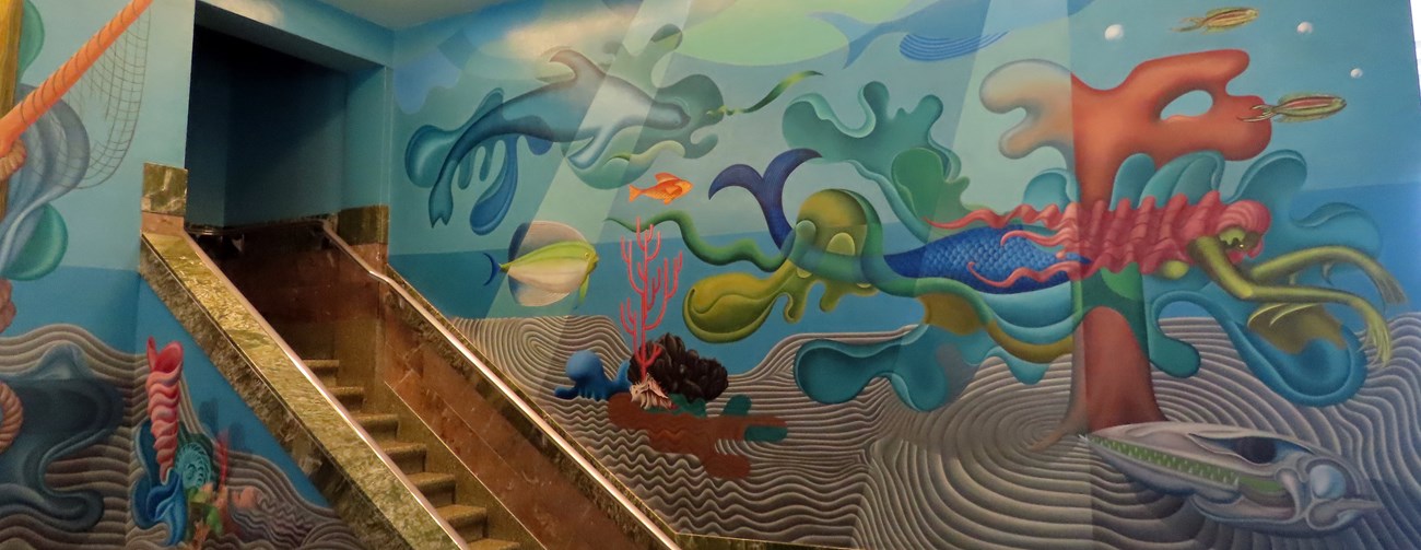 detail of a surreal undersea painting depicting a mermaid and fish