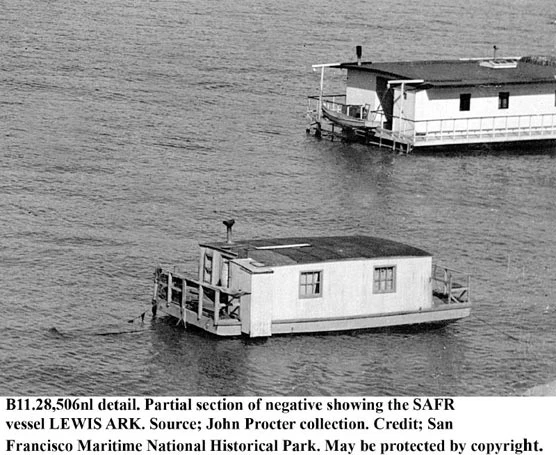 Two houseboats floating on the water.
