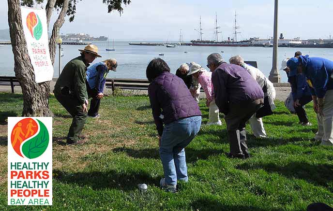 People exercising gently near Aquatic Park cove.