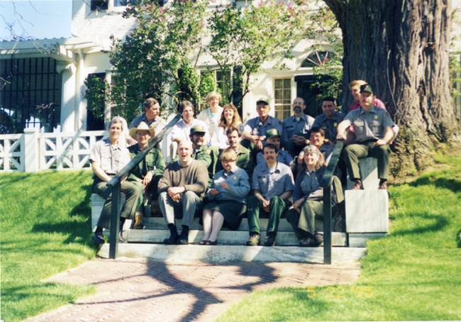 SAGA staff early 1990s group of park rangers in front of historic house