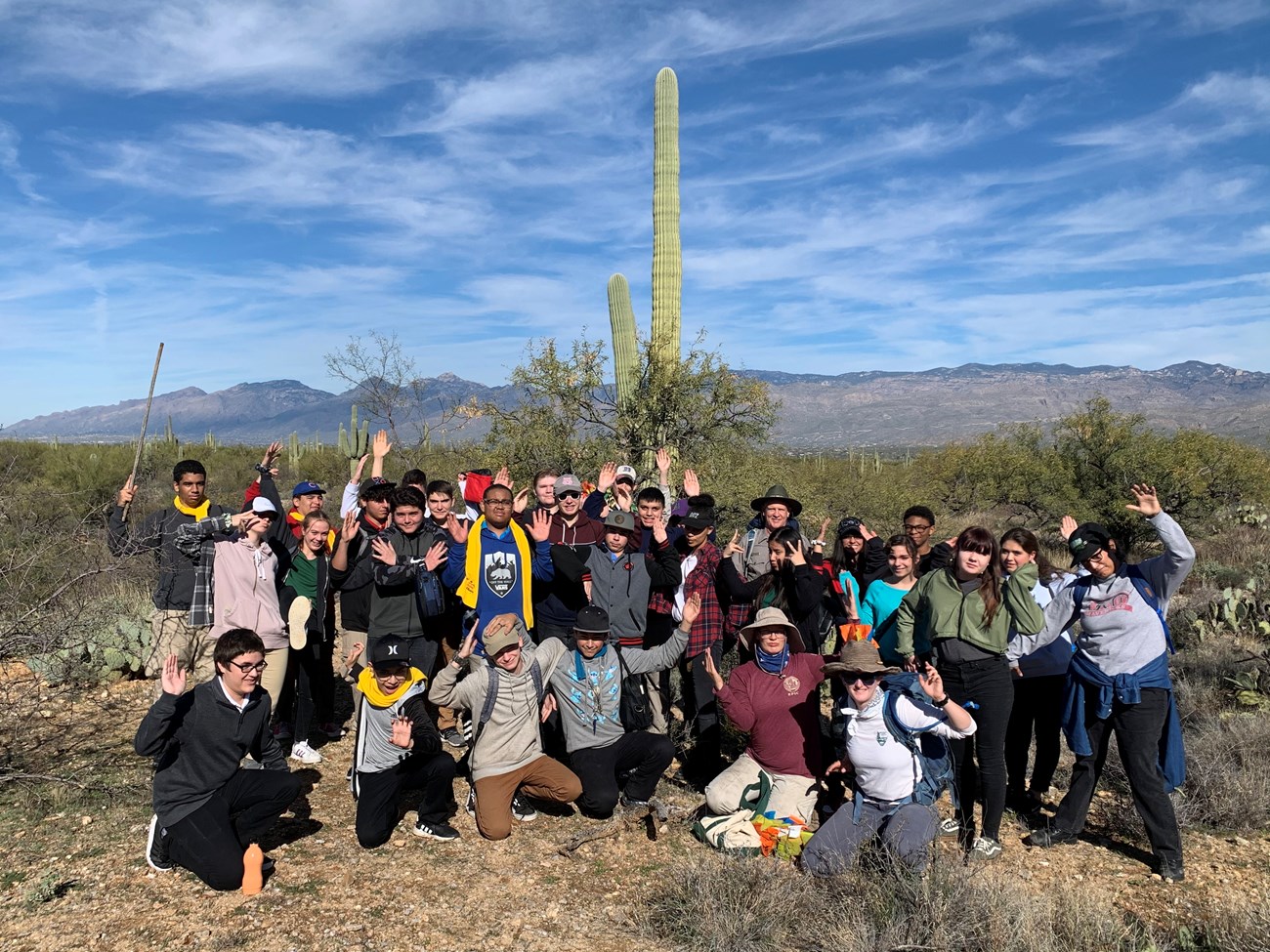 Students posing like a saguaro.