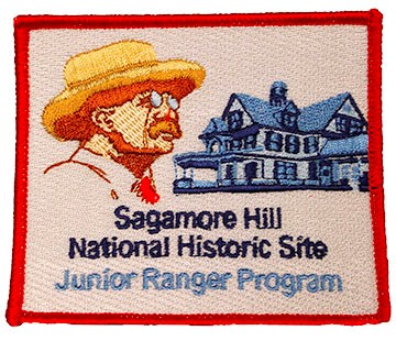 A stitched rectangular patch with an image of Roosevelt and his home. Text below reads, "Sagamore Hill National Historic Site Junior Ranger Program."