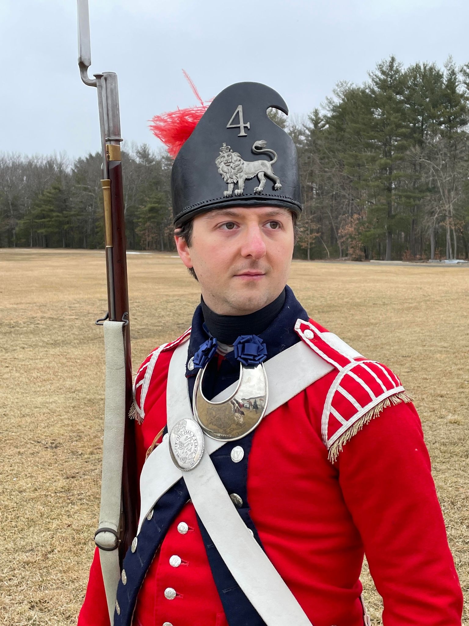 A living history volunteer portrays a British soldier at the encampment. This is a light infantry officer from the 4th or King's Own Regiment of Foot.